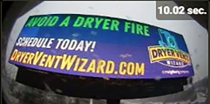 Screen capture of a digital board. It says AVOID A DRYER FIRE. SCHEDULE TODAY! with the brand's logo to the right and website below.