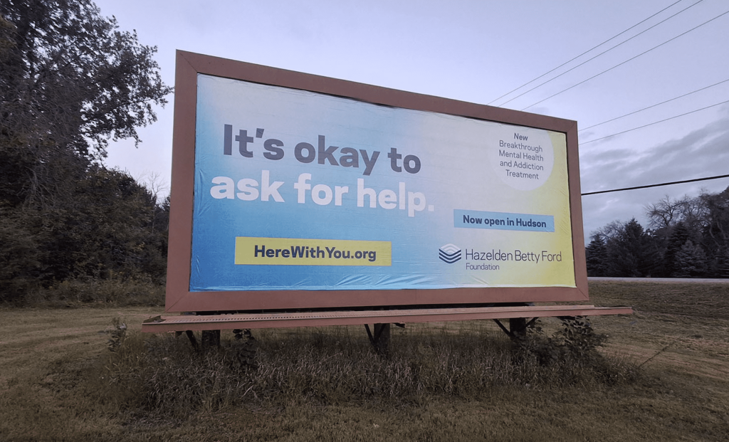 A billboard campaign for a mental health awareness ad for Hazelden Betty Ford Foundation stating "It's okay to ask for help".