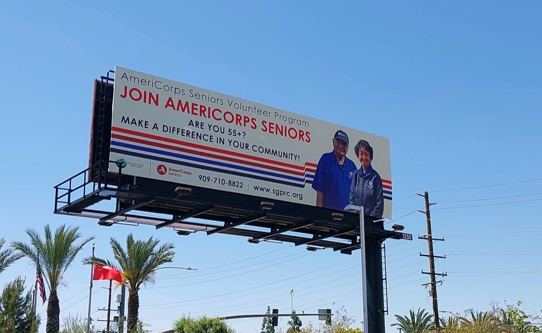 Billboard inviting people 55 and older to join AmeriCorps Seniors and make a difference in their community